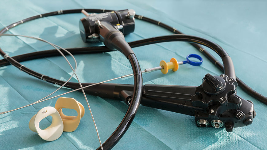 A flexible endoscope laying on a table